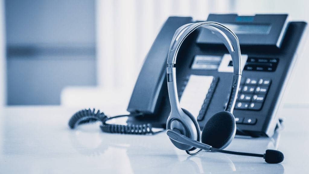 communication support call center customer service help desk voip headset telephone keyboard scaled