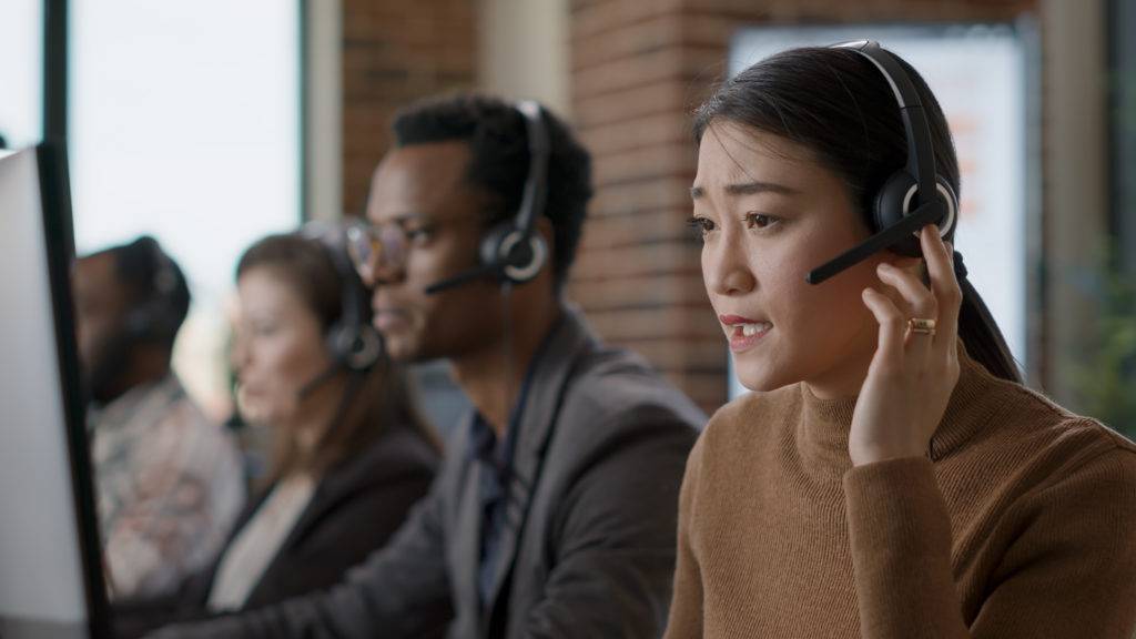 female-sales-agent-talking-phone-call-client-helping-people-customer-support-service-woman-using-headphones-give-assistance-call-center-workstation-helpdesk